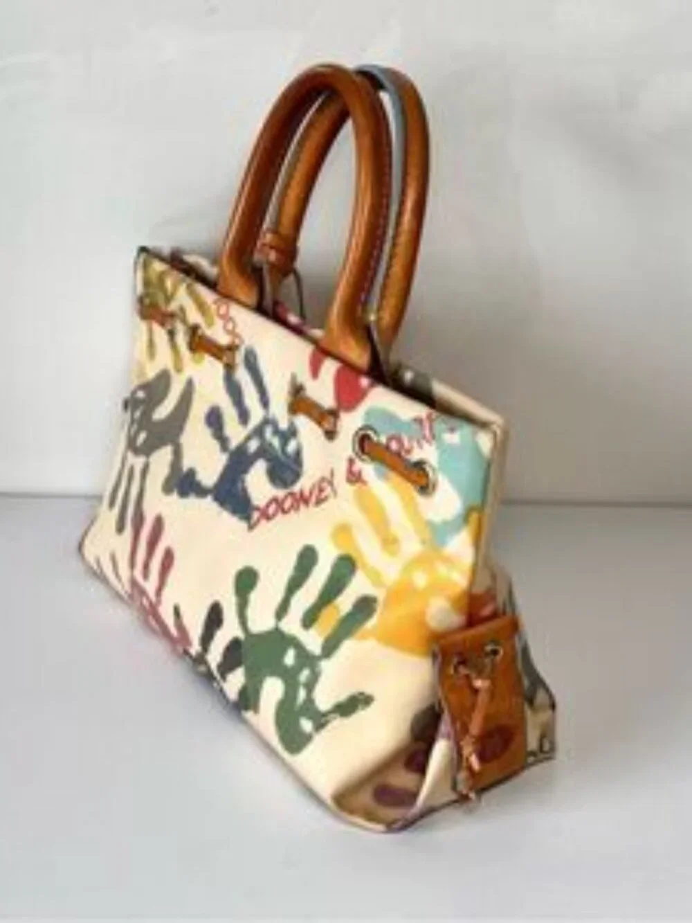 DOONEY & BOURKE Authentic Vintage Y2K Leather Baby Hands Print Tassel Bag